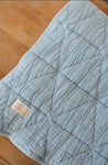 New Grain Quilted Crib Blanket in Powder