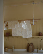 ferne baby Embroidered Swaddle - Rocking Horse