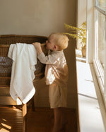 ferne baby Embroidered Swaddle - Rocking Horse