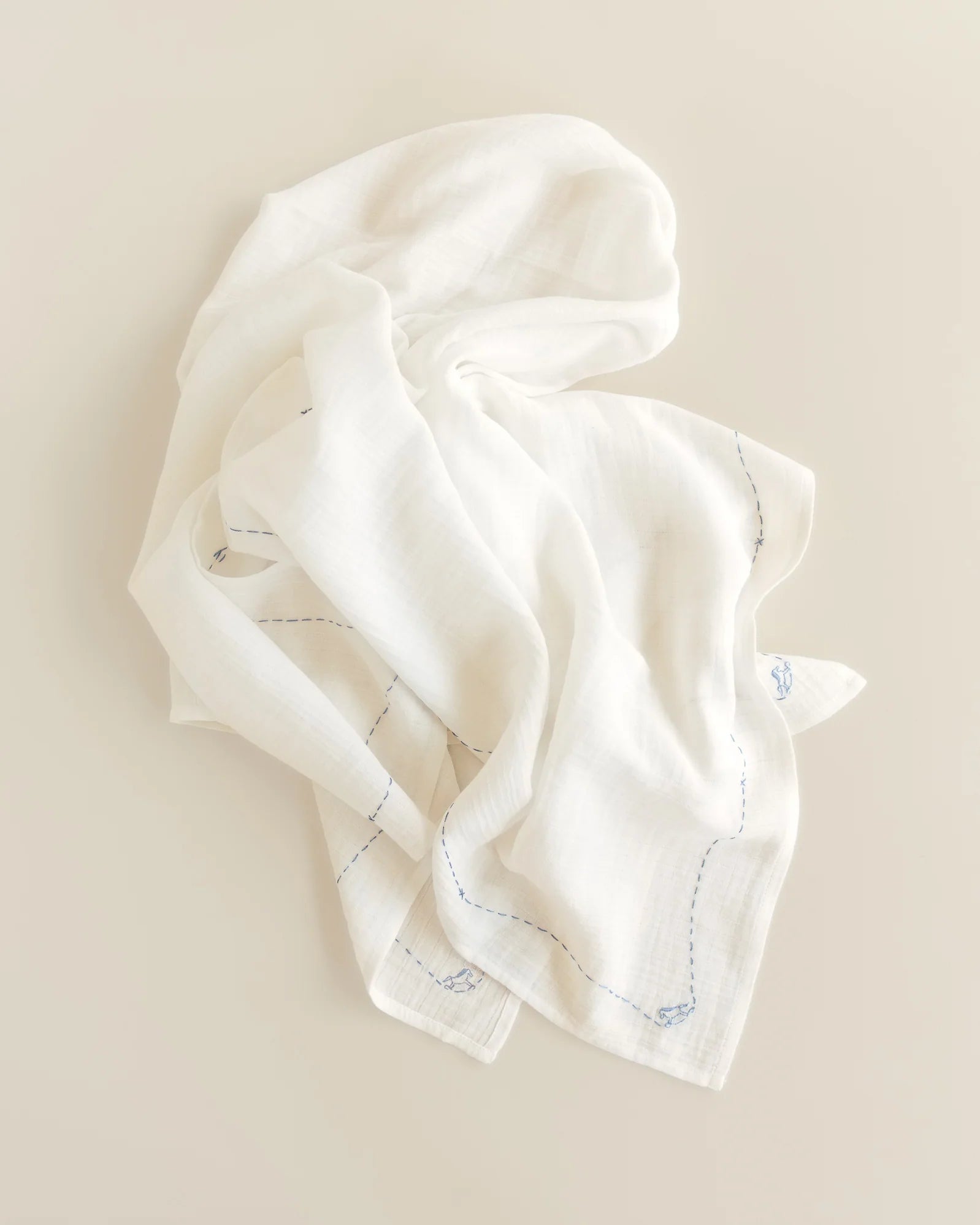 ferne baby Embroidered Swaddle - Rocking Horse