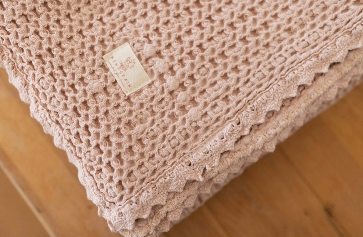 New Grain Cozy Waffle Baby Blanket in Petal