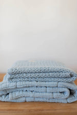 New Grain Cozy Waffle Baby Blanket in Powder