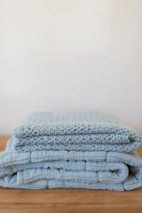 New Grain Cozy Waffle Baby Blanket in Powder