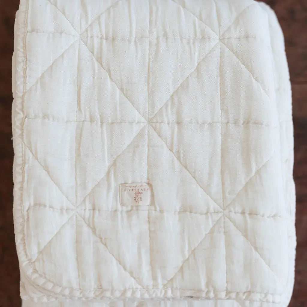 New Grain Quilted Crib Blanket in Natural