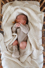 New Grain Cozy Waffle Baby Blanket in Milk